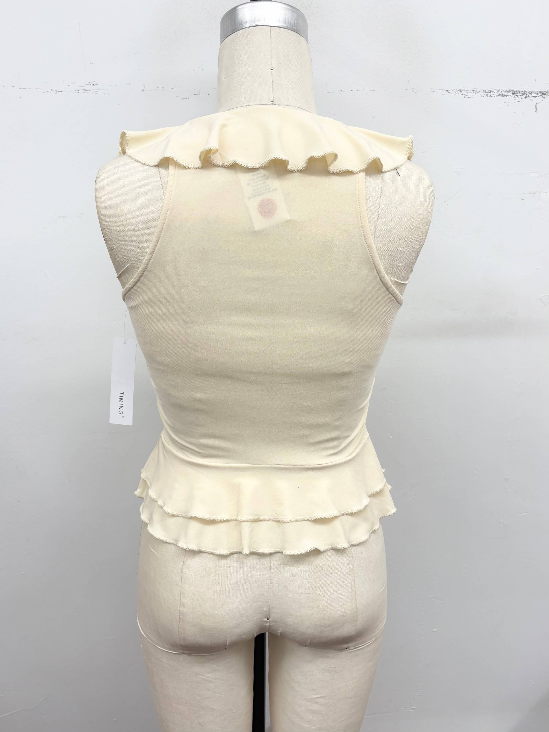 Ruffle Trim Sleeveless Peplum Top