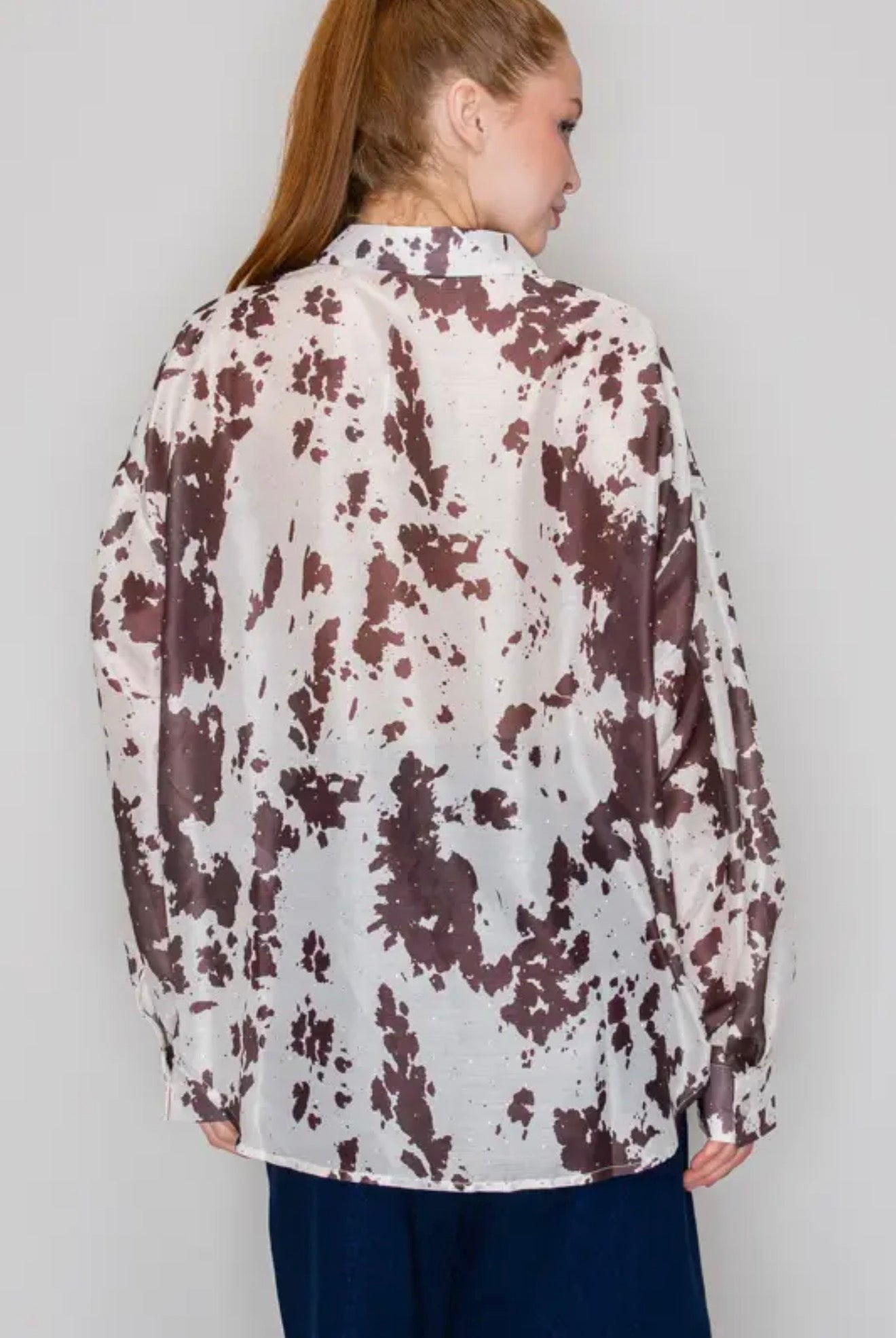 Dusty Trails Cow Print Button-Up Top