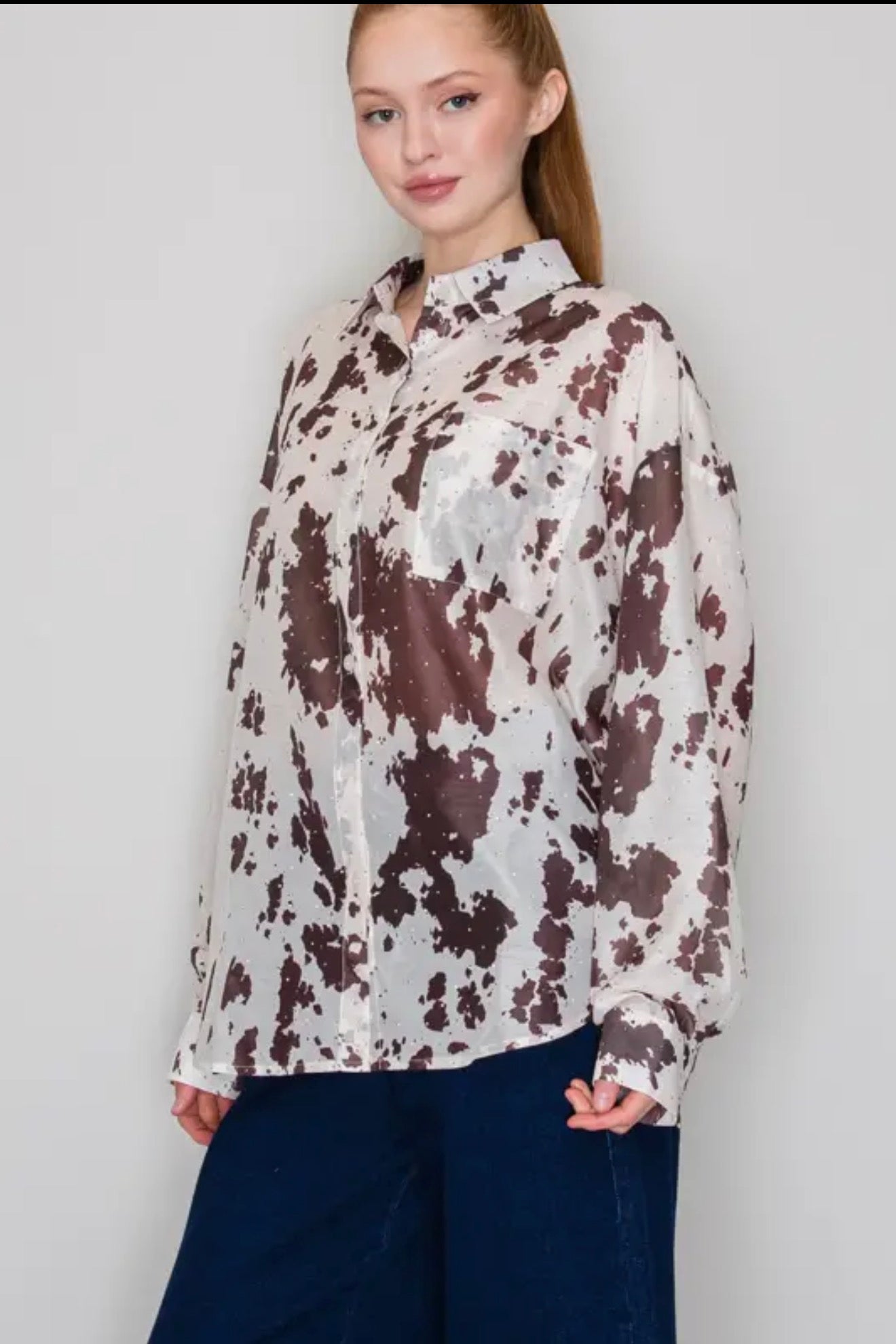 Dusty Trails Cow Print Button-Up Top
