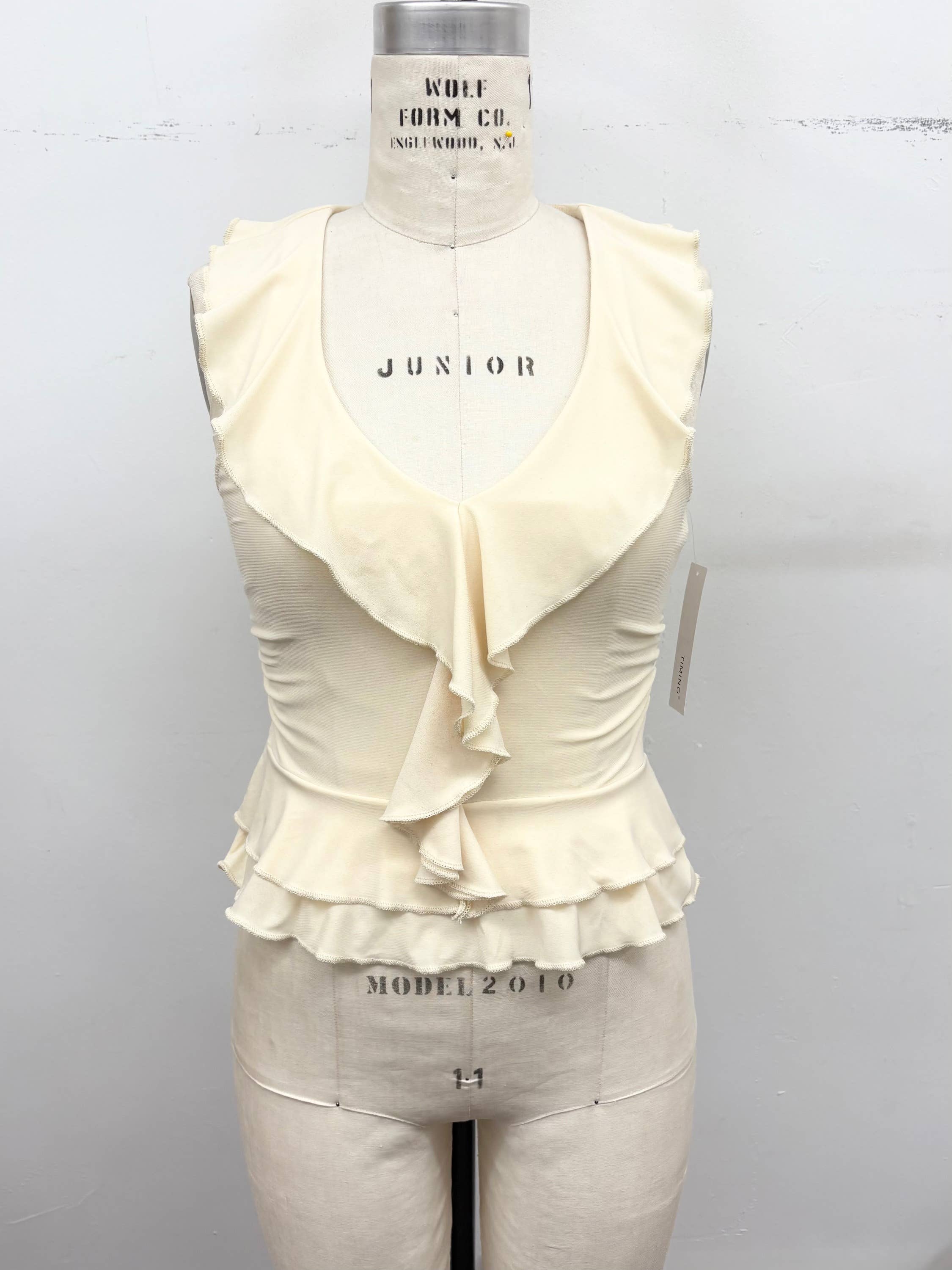 Ruffle Trim Sleeveless Peplum Top